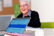 Teachers working on a laptop
