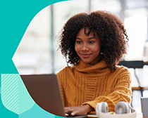 Teacher working on a laptop