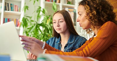 Student and teacher in class