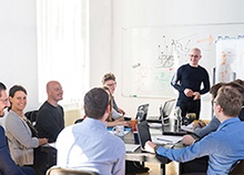 Teachers in a room talking