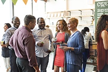 Teachers chatting at a conference