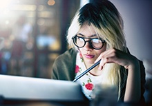 person looking at laptop
