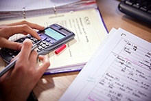 Person using calculator