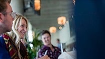 Teachers at a conference - sitting down talking