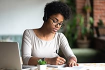 Teacher attending an online training course