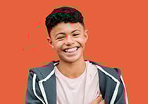 Student smiling at the camera