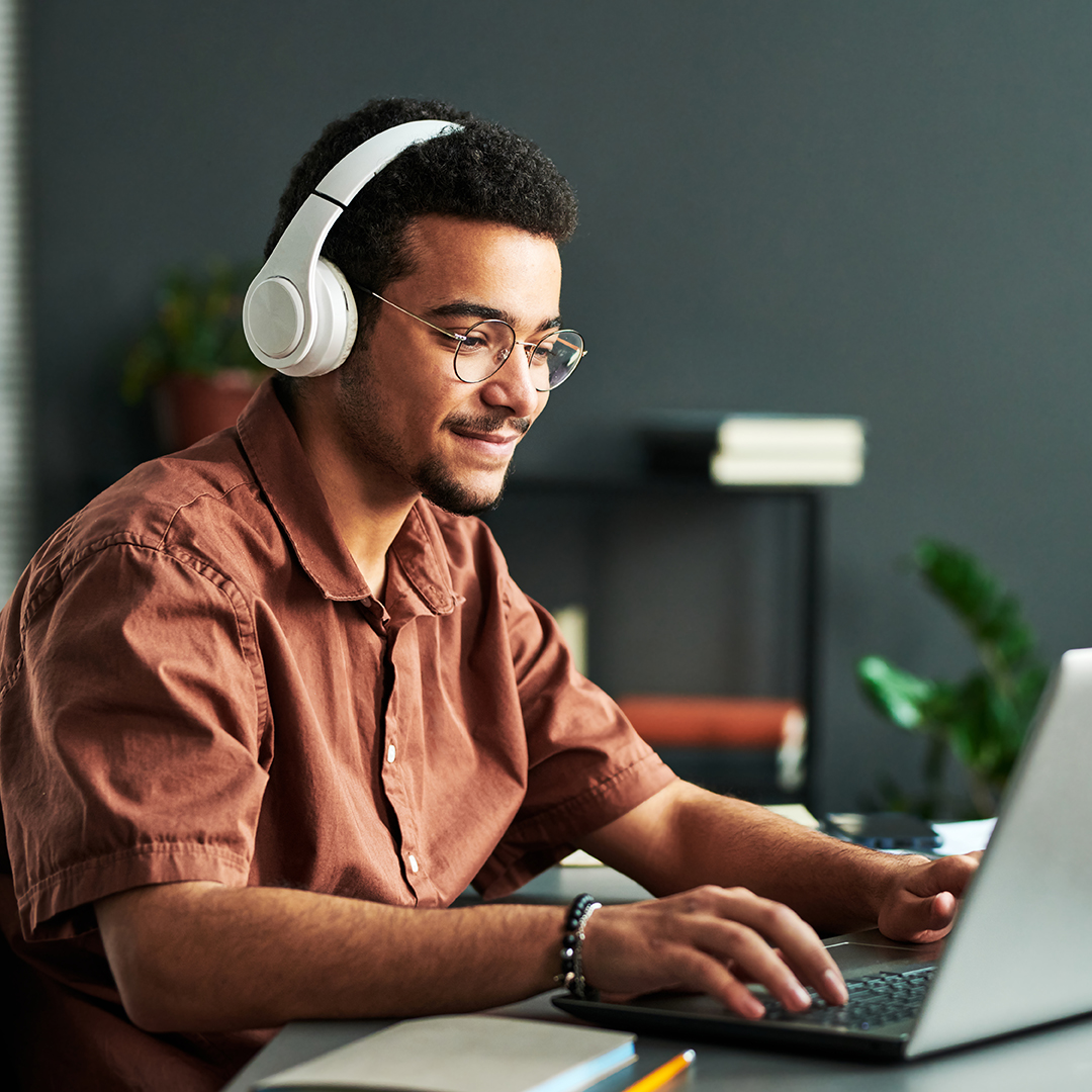 A teacher working on a laptop A teacher working on a laptop