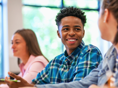 Business student smiling in class